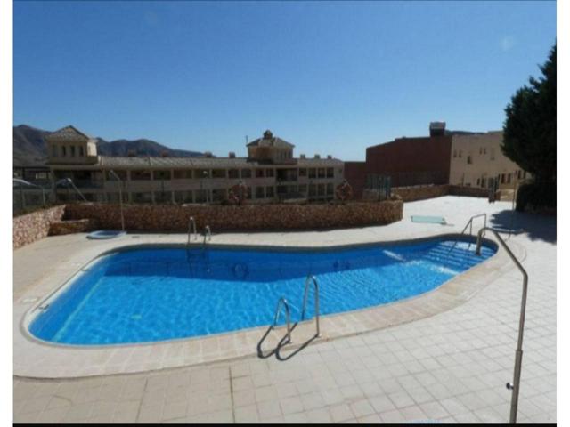 COQUETO PISO CON TERRAZA, GARAJE Y PISCINA EN LA ENVIA photo 0