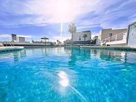 Vivienda reformada con terrazas, solárium y piscina comunitaria photo 0