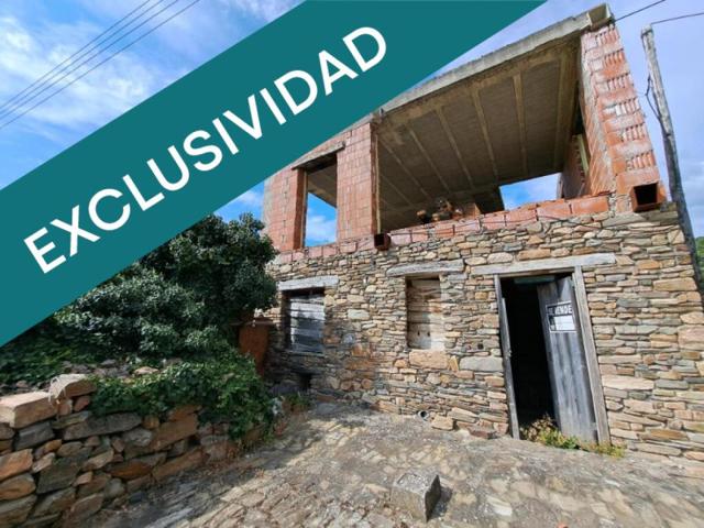 Terreno con casa en obra para terminar vivienda. photo 0