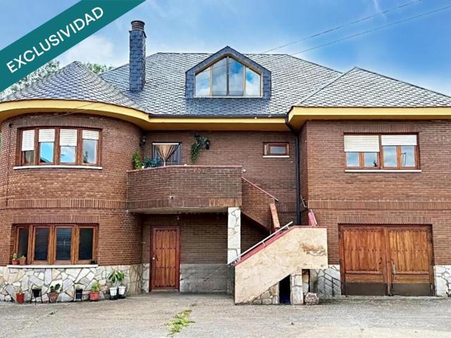 CASA UNIFAMILIAR con JARDÍN y Local en Azadinos (Sariegos) León photo 0