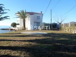 EXCLUSIVA VILLA A LA ORILLA DEL MAR! Oportunidad. photo 0