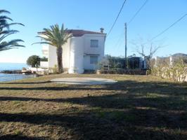 EXCLUSIVA VILLA A LA ORILLA DEL MAR! Oportunidad. photo 0