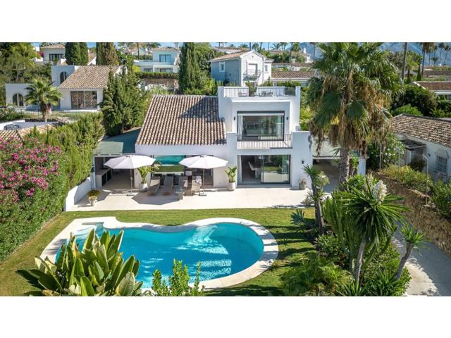 Villa En venta en Marbella photo 0