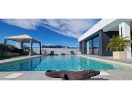 Villa En venta en Marbella photo 0