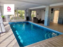 CASA CON DOS PLANTAS INDEPENDIENTES Y PISCINA INTERIOR CLIMATIZADA photo 0