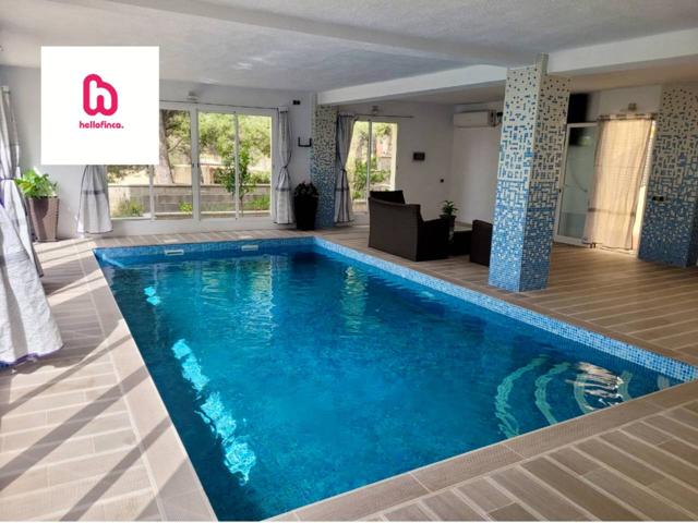 CASA CON DOS PLANTAS INDEPENDIENTES Y PISCINA INTERIOR CLIMATIZADA photo 0